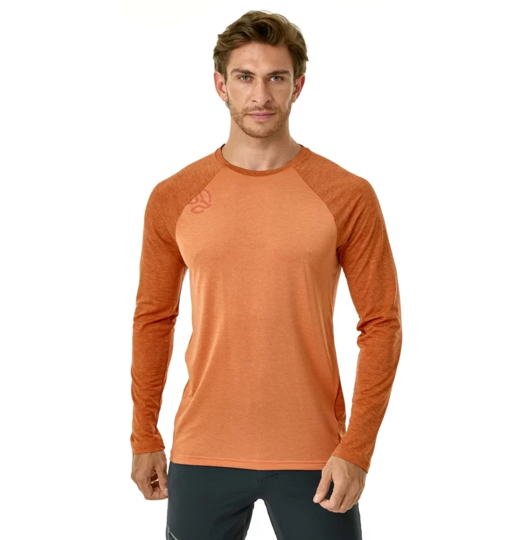 Мужская футболка Ternua Krodi LS Tee Mns в сине-адриатическом цвете для активного отдыха, туризма и путешествий, подходит для носки в походах и горных приключениях в магазине экипировки для активной жизни